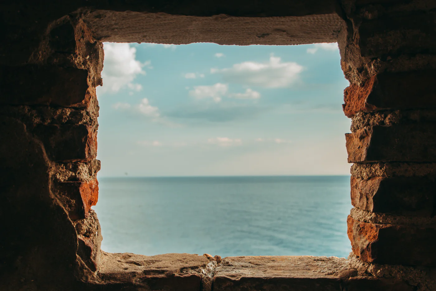 Deep stone window looking straight out over the sea
